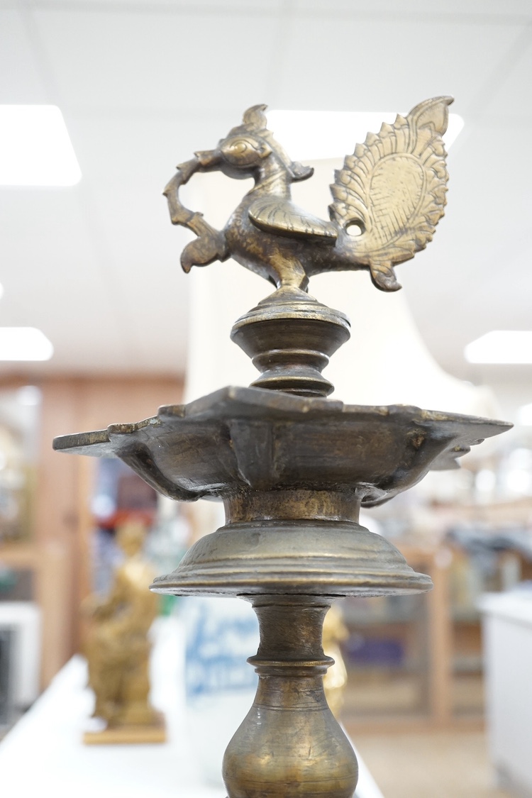 A two large Indian bronze temple oil lamps, 18th/19th century, tallest 58 cm high. Condition - fair